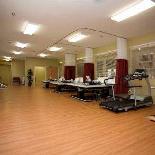 Spacious indoor gym with treadmills and fitness equipment.