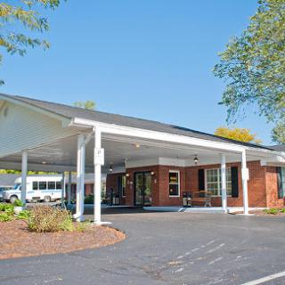 A well-designed facility with a welcoming entrance and spacious outdoor area.