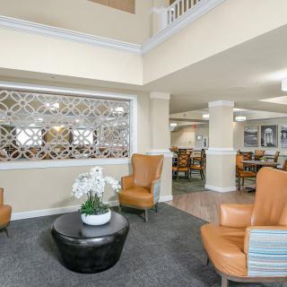 A modern lobby area with comfortable seating and elegant decor.