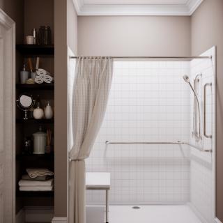 A modern bathroom with a tiled shower and neatly arranged shelves.