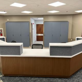 A modern reception area with a streamlined design and neutral colors.