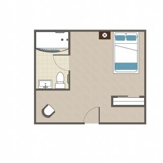 A simple floor plan featuring a bedroom and bathroom layout.