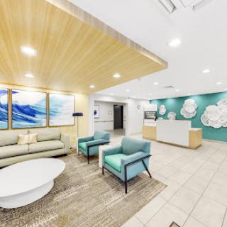 A stylish and modern lobby featuring comfortable seating and artistic decor.