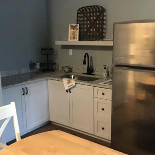 Cozy kitchen with modern appliances and ample counter space.