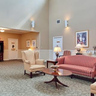 A cozy lobby area with comfortable seating and elegant decor.