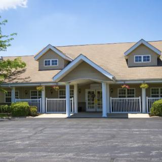 A suburban residential building with a welcoming entrance and well-maintained exterior.