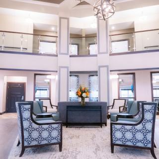 A luxurious and modern lobby with elegant furniture and sophisticated design.
