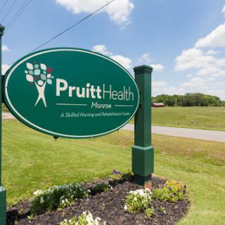 Entrance sign for PruittHealth, a healthcare facility specializing in nursing services.