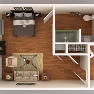 A top view of a one-bedroom apartment floor plan featuring a bedroom, living area, kitchen, and bathroom.