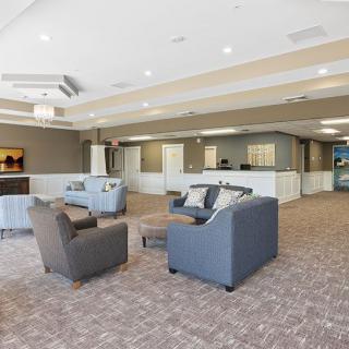 A modern lobby with comfortable seating and stylish decor.
