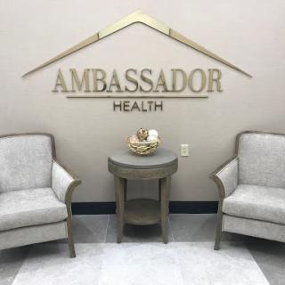 A cozy waiting area showcasing the Ambassador Health brand.