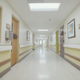 A clean and well-lit hospital hallway, showcasing a welcoming healthcare environment.