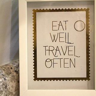 Inspirational framed quote: Eat well, travel often.