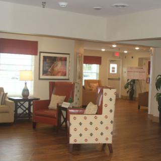 A welcoming and comfortable lobby area featuring cozy seating and soft lighting.