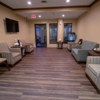 A well-organized waiting room with comfortable seating and modern decor.