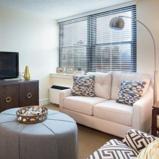 A modern living room with stylish furniture and a cozy atmosphere.