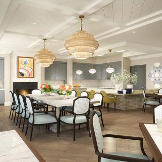 A modern and elegant dining room with stylish furniture and lighting.