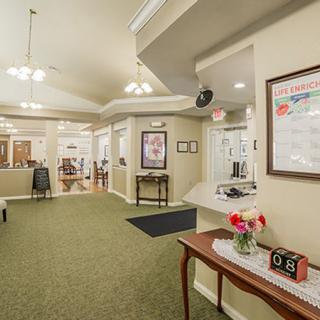 A welcoming reception area with decorative furnishings and ambient lighting.