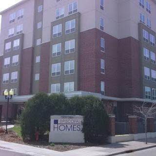 A modern residential building with a welcoming entrance.