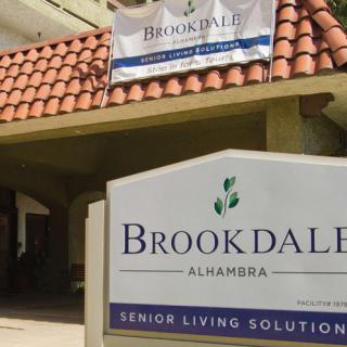 Entrance sign for Brookdale Alhambra Senior Living Solutions.