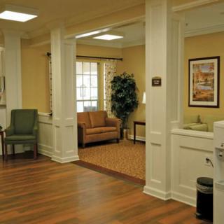 A cozy living room with comfortable seating and elegant decor.