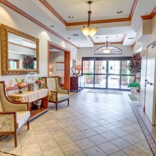 A well-decorated lobby with elegant furniture and ambient lighting.