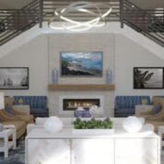 A modern living room with stylish furniture, a central fireplace, and contemporary artwork.