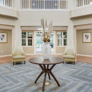 A modern lobby with elegant decor and comfortable seating arrangements.
