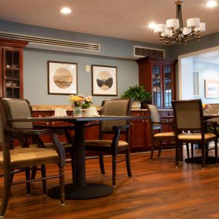 A stylish dining area featuring elegant furniture and tasteful decor.