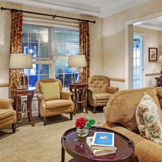 Cozy living room with comfortable seating and warm lighting.