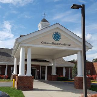 Exterior view of a healthcare facility with a welcoming entrance.