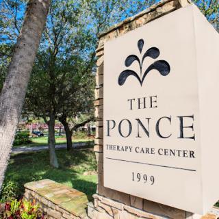 The Ponce Therapy Care Center, established in 1999, features a welcoming exterior with lush greenery.
