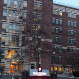 A university building with a prominent entrance and signage.