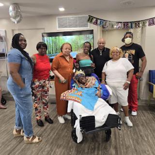 A joyful family gathering celebrating a special occasion together.