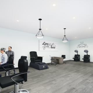 A modern salon interior with styling chairs and minimalist decor.