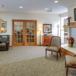 A cozy living room with comfortable seating and warm decor.
