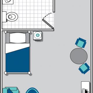 A floor plan depicting a compact living space with a bedroom, bathroom, and furniture arrangement.