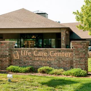 Entrance of the Life Care Center with visible signage and landscaping.
