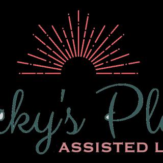 A logo for an assisted living facility featuring a sunburst design.