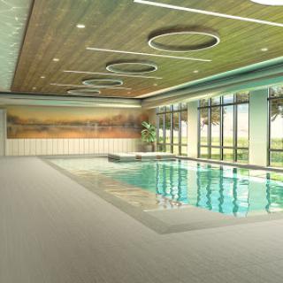 A serene indoor pool area featuring modern architecture and abundant natural light.