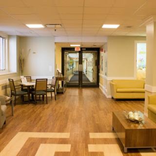A spacious lobby area featuring comfortable seating and a welcoming atmosphere.