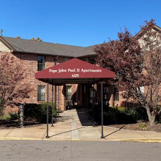 Entrance to Pope John Paul II Apartments.