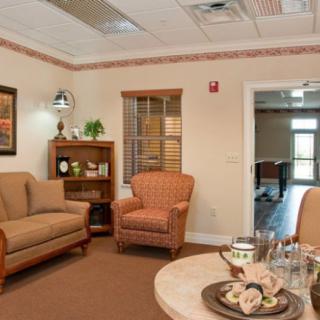 A cozy living room with comfortable seating and warm decor.