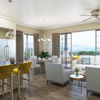 A modern open-concept living space featuring a dining area, kitchen, and cozy seating with ample natural light.