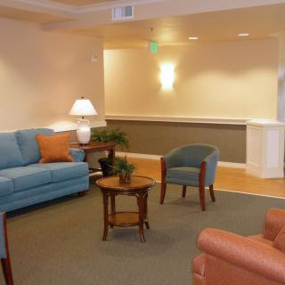 A cozy living room with sofas and a coffee table.