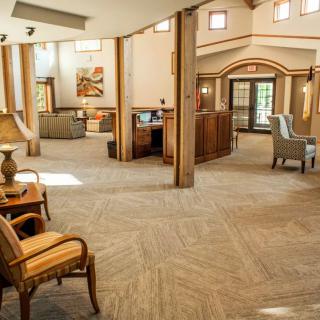 Spacious and elegantly furnished lobby area with comfortable seating.