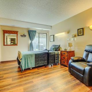 A cozy bedroom with modern furnishings and a relaxing atmosphere.