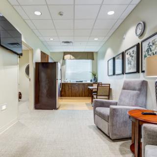 A modern waiting area featuring comfortable seating and tasteful decor.