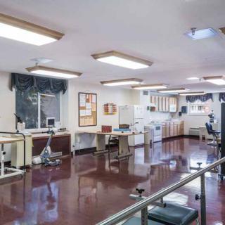 A well-equipped rehabilitation room in a healthcare facility.