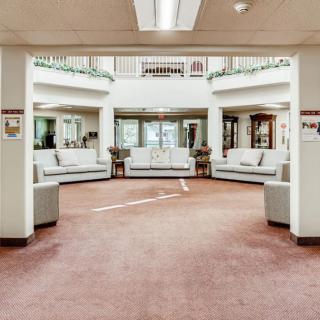 A spacious lobby with comfortable seating and ample natural light.